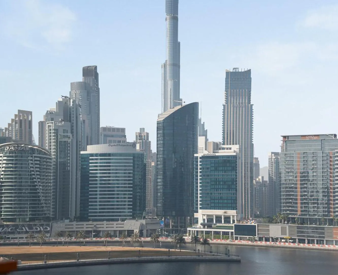 Apartment Iconic Studio Canal & Burj View Central, Scenic Serene Dubai